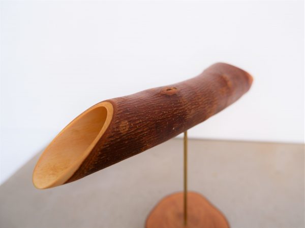 cucchiaio di legno a forma di cannolo siciliano