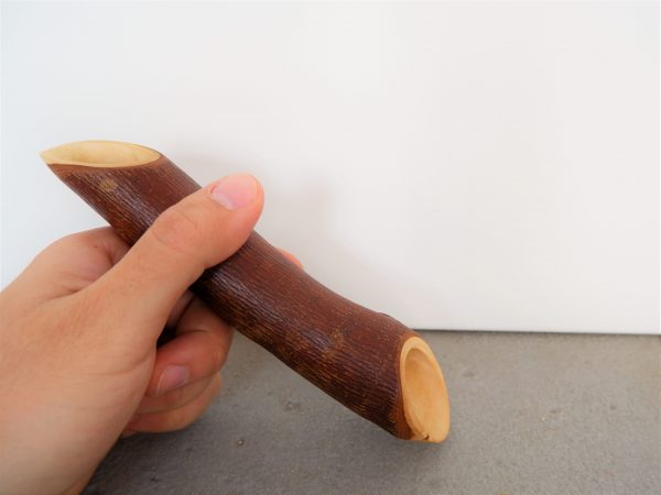 cucchiaio di legno a forma di cannolo siciliano